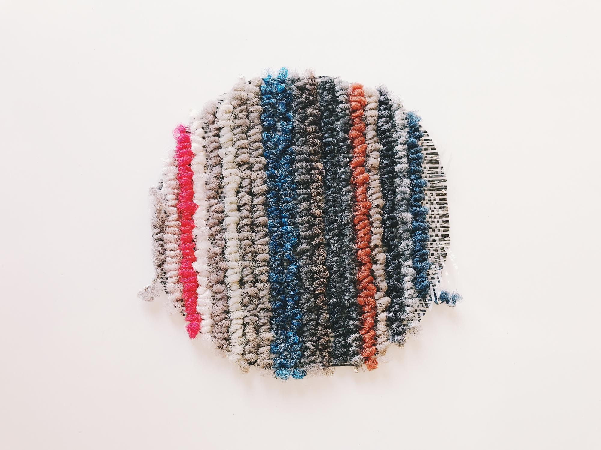 Flatlay of embroidered samples and swatches